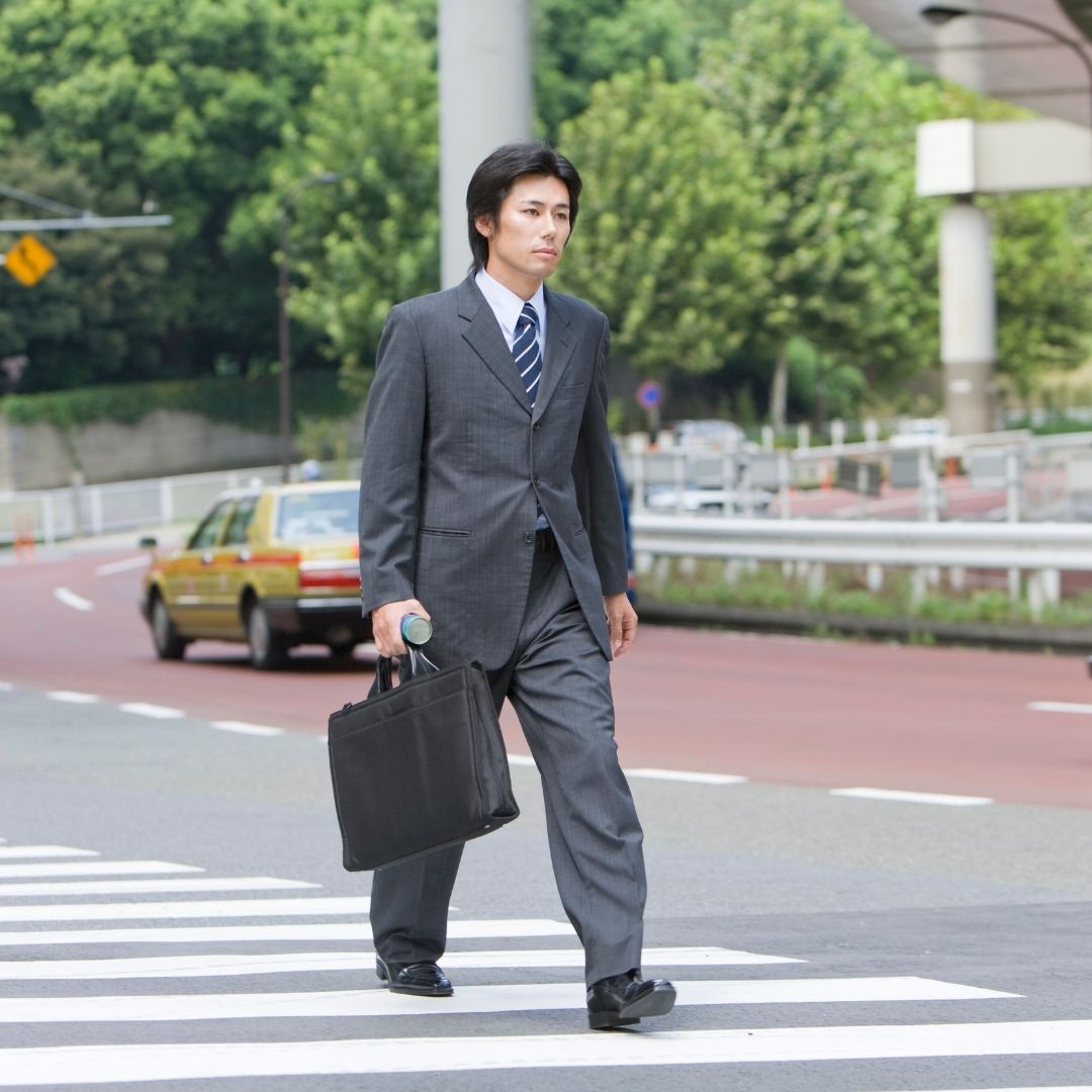 man using crosswalk 