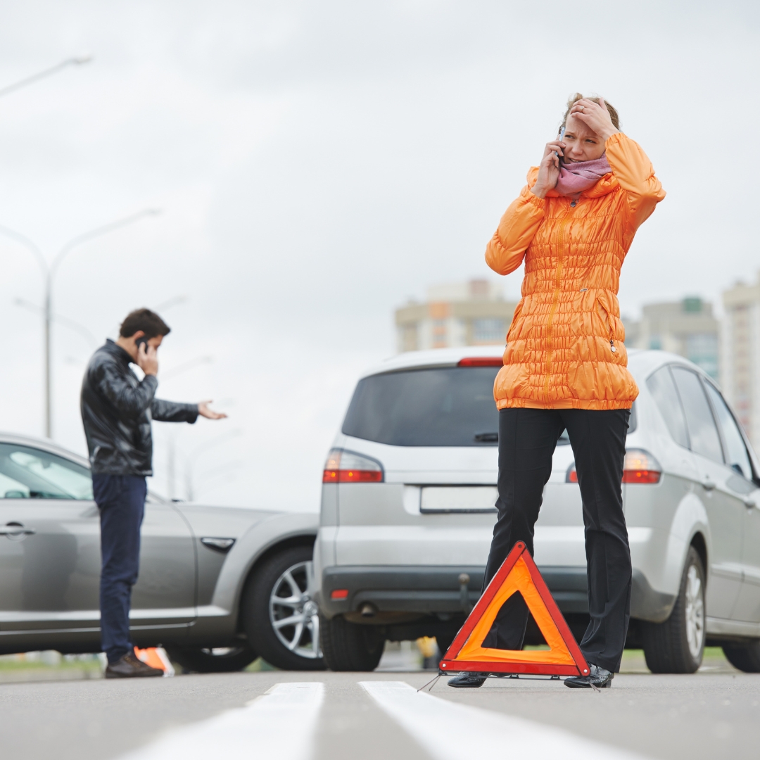 People on the phone after an accident