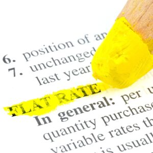 a yellow colored pencil highlighting a definition of Flat Rate