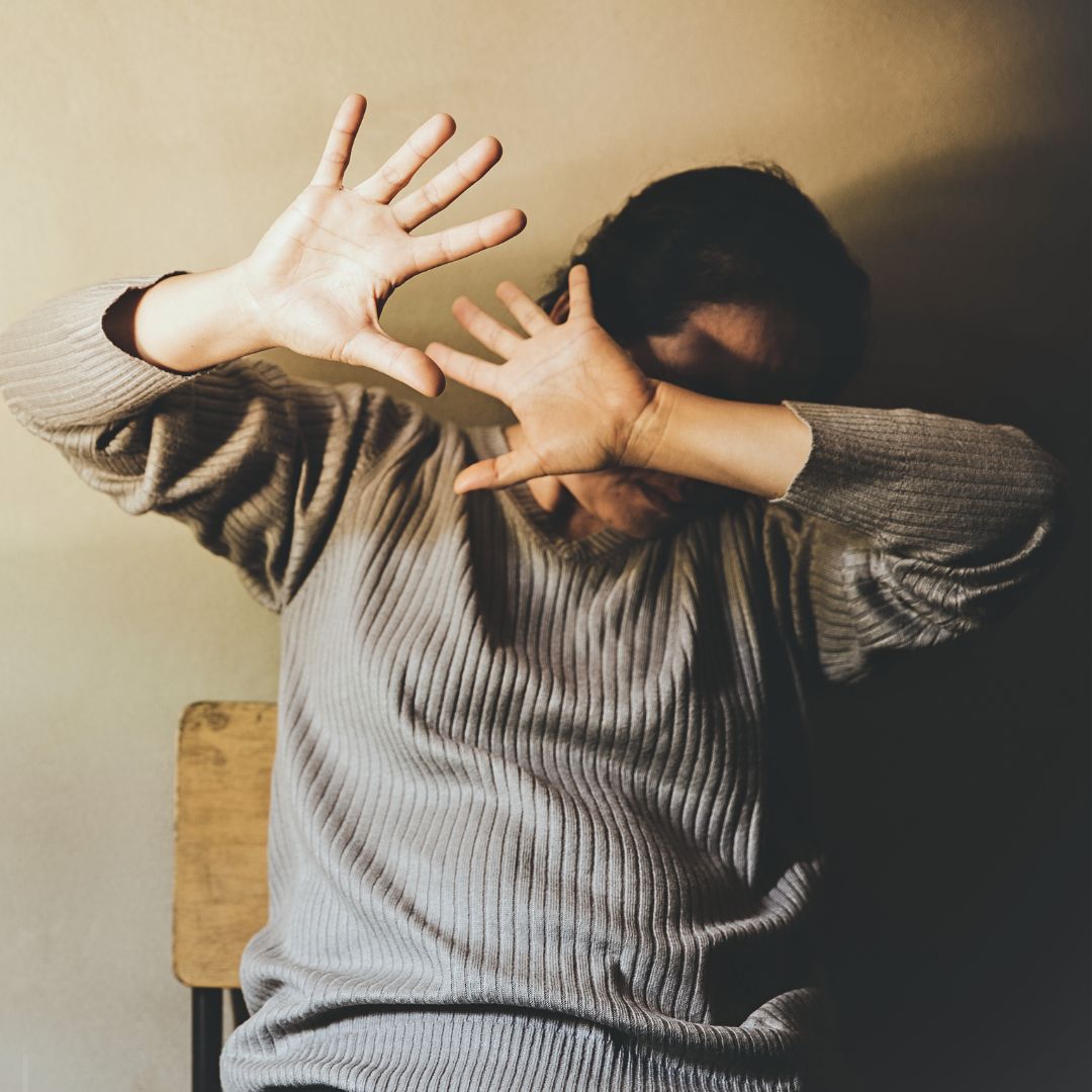 woman defending herself from assault