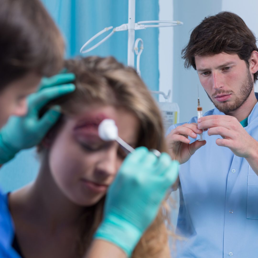 woman at hospital being treated