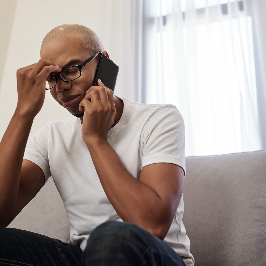 Man frustrated on phone 