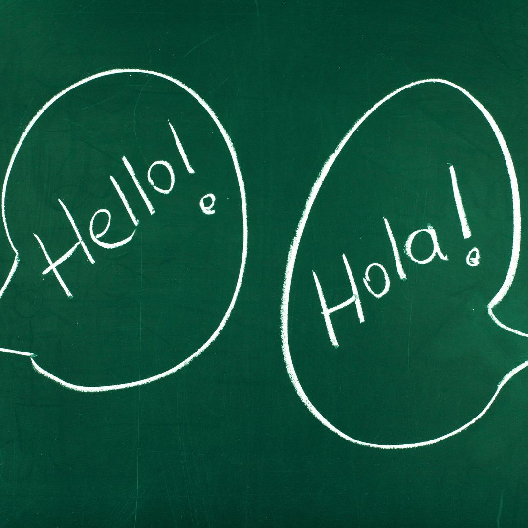 chalkboard with the words Hello! and Hola! 