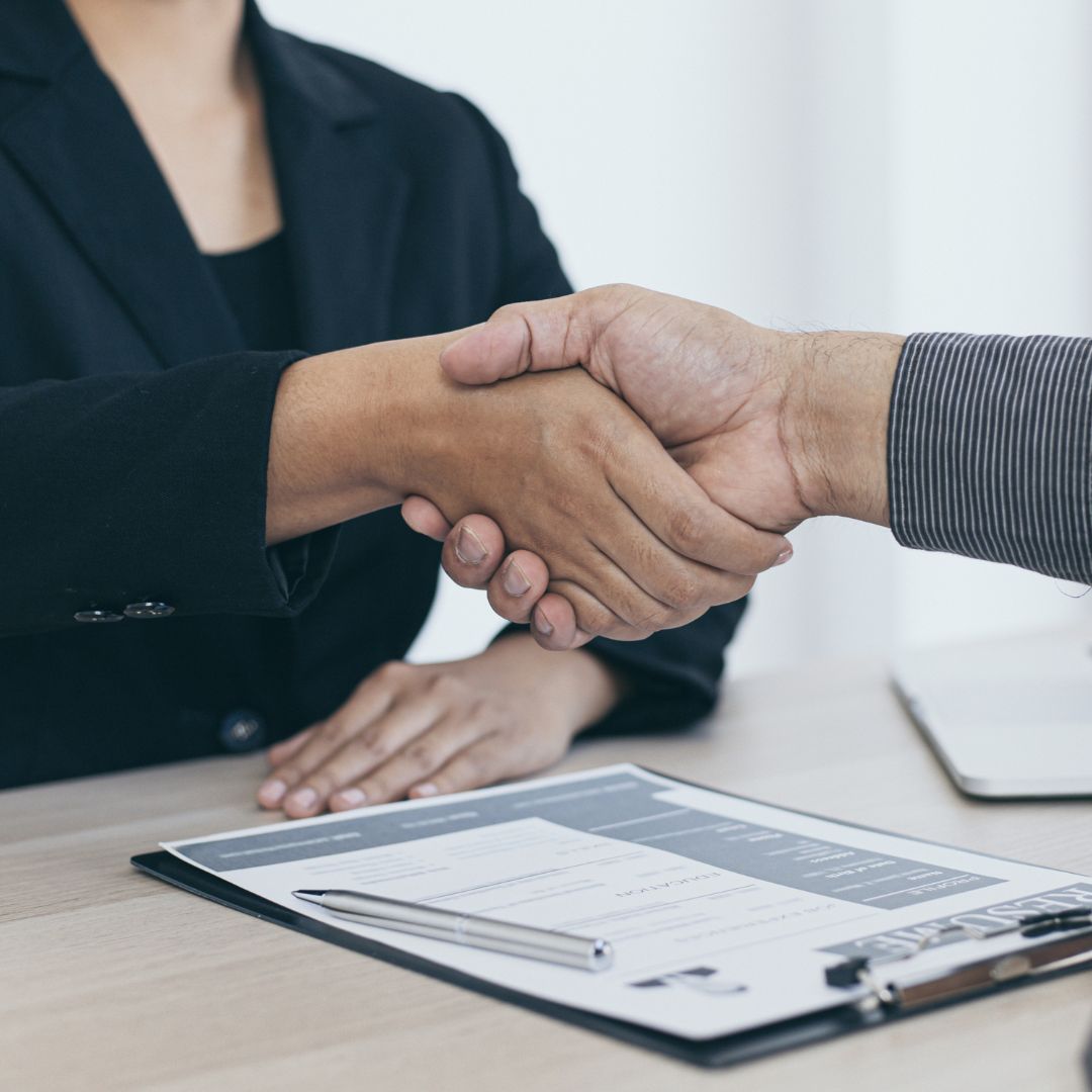 people shaking hands 