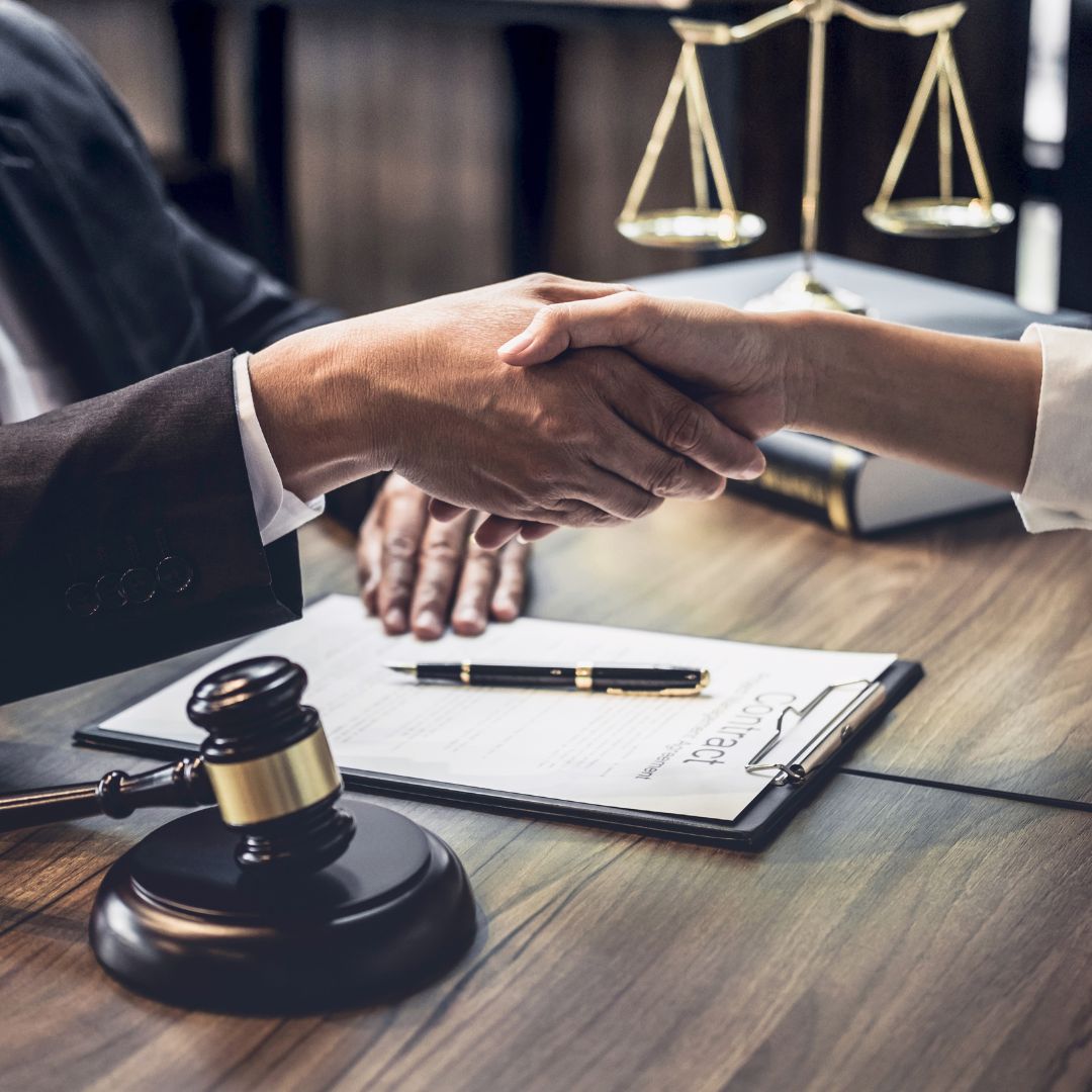 shaking hands with lawyer