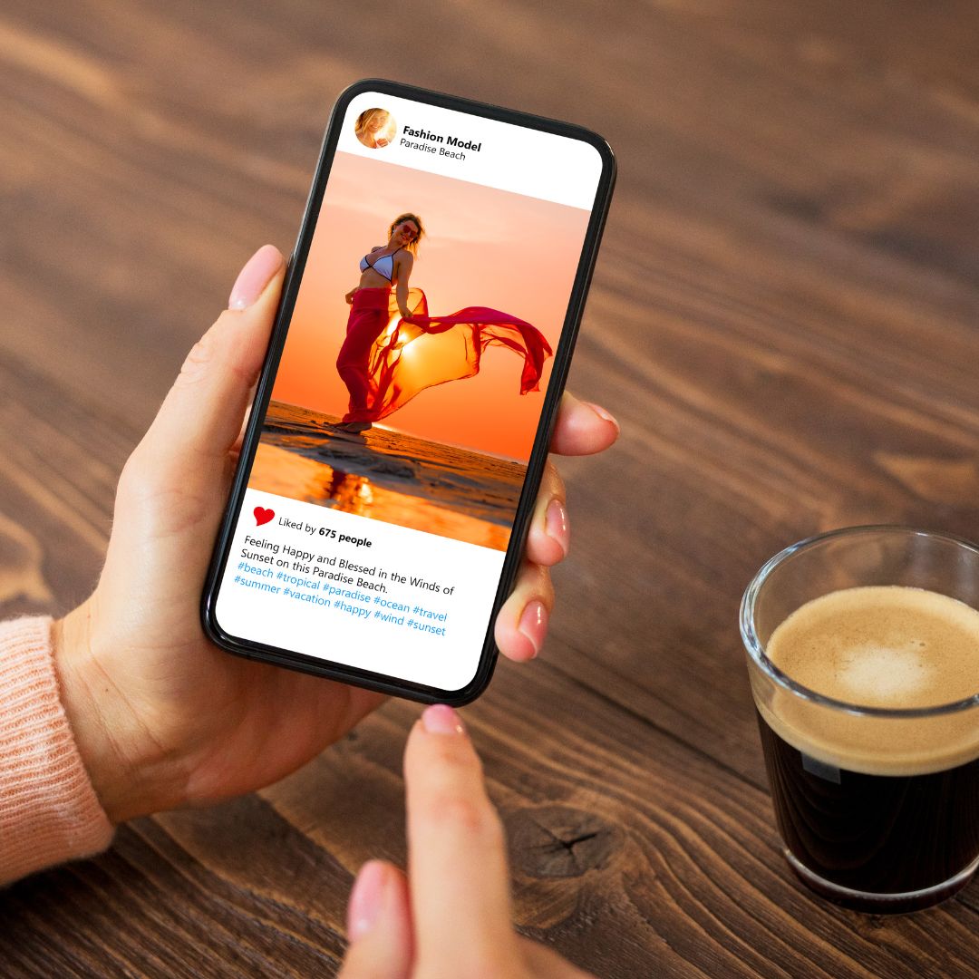 Woman holding a phone and viewing an Instagram post. 