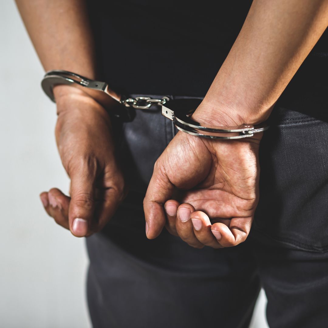 Person in handcuffs