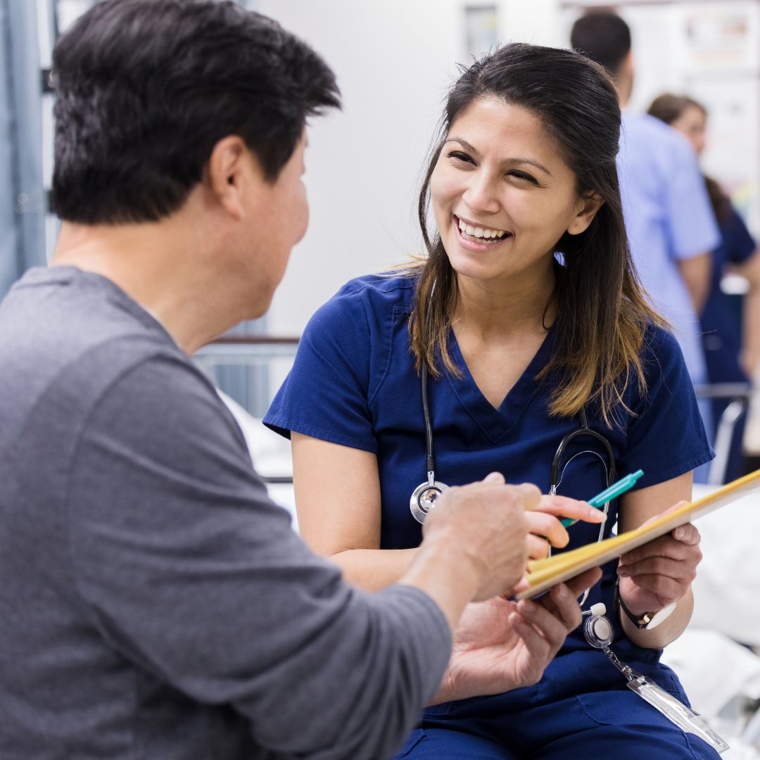 Man speaking with a nurse