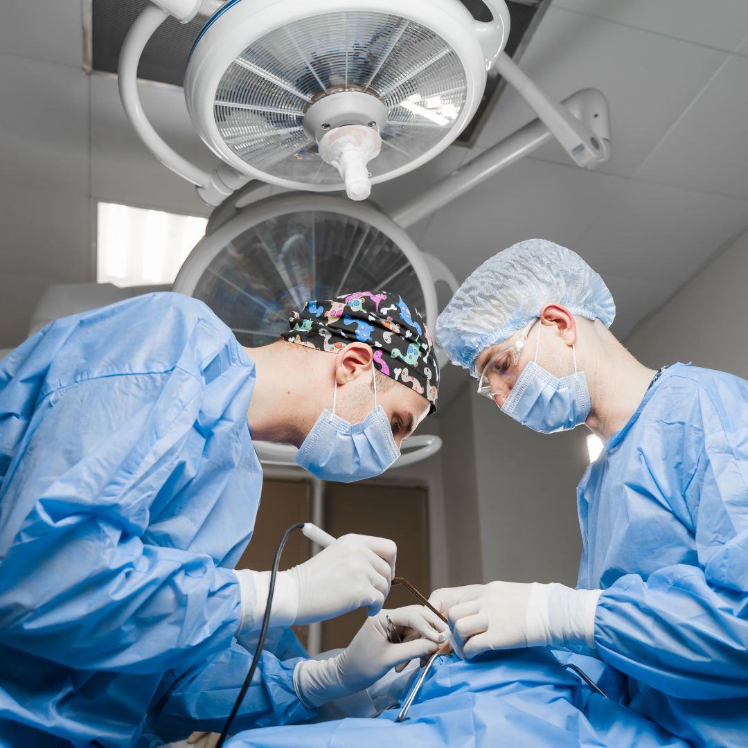 Surgeons performing surgery
