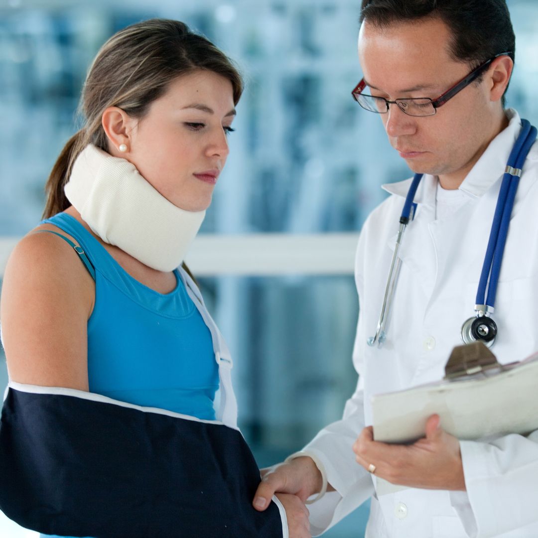 An injured women speaking with a doctor