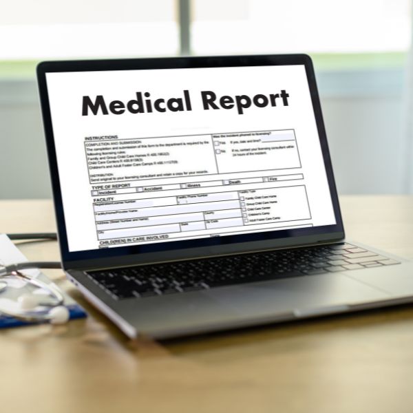 A laptop with a medical report