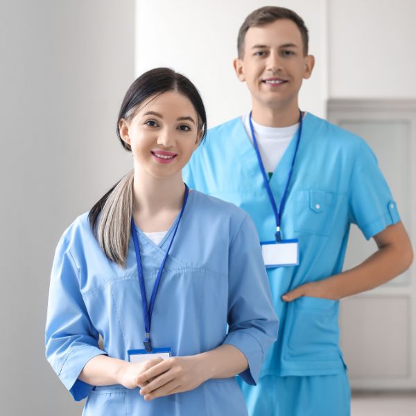 Two doctors standing next to each other 