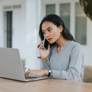 img of a woman on the phone