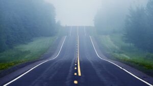 A long road with fog