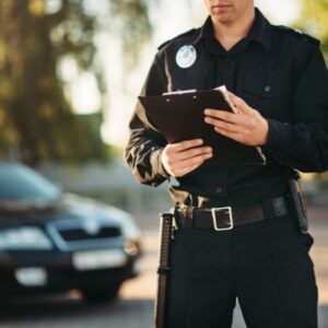 A police officer filling out a report