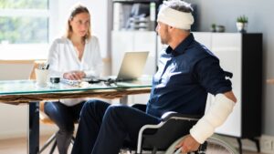 An injured person speaking to a doctor
