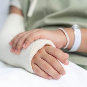 A person with a broken arm