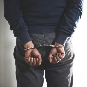 A person in handcuffs