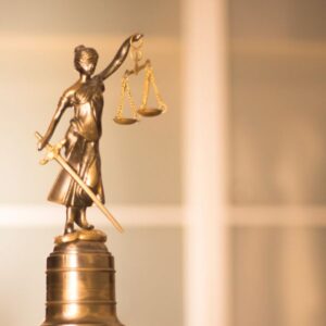 A golden statue of Lady Justice