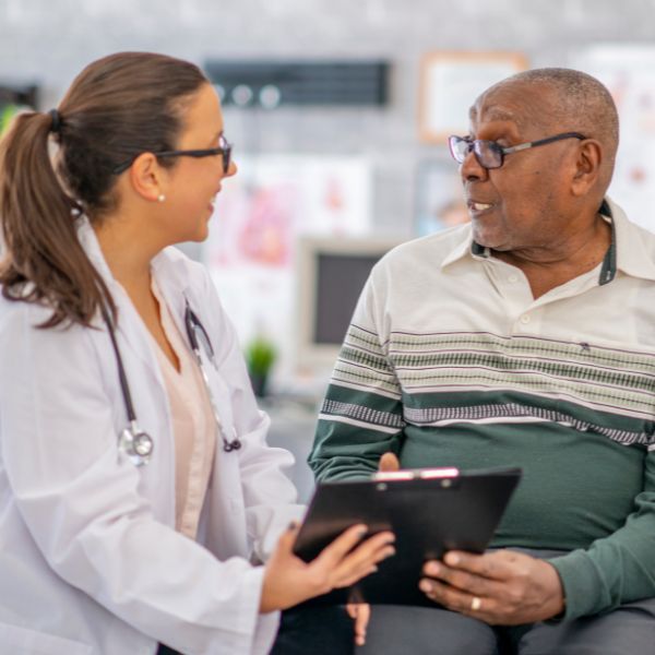 A man speaking with his doctor