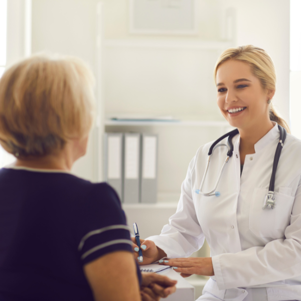 A women speaking to a doctor