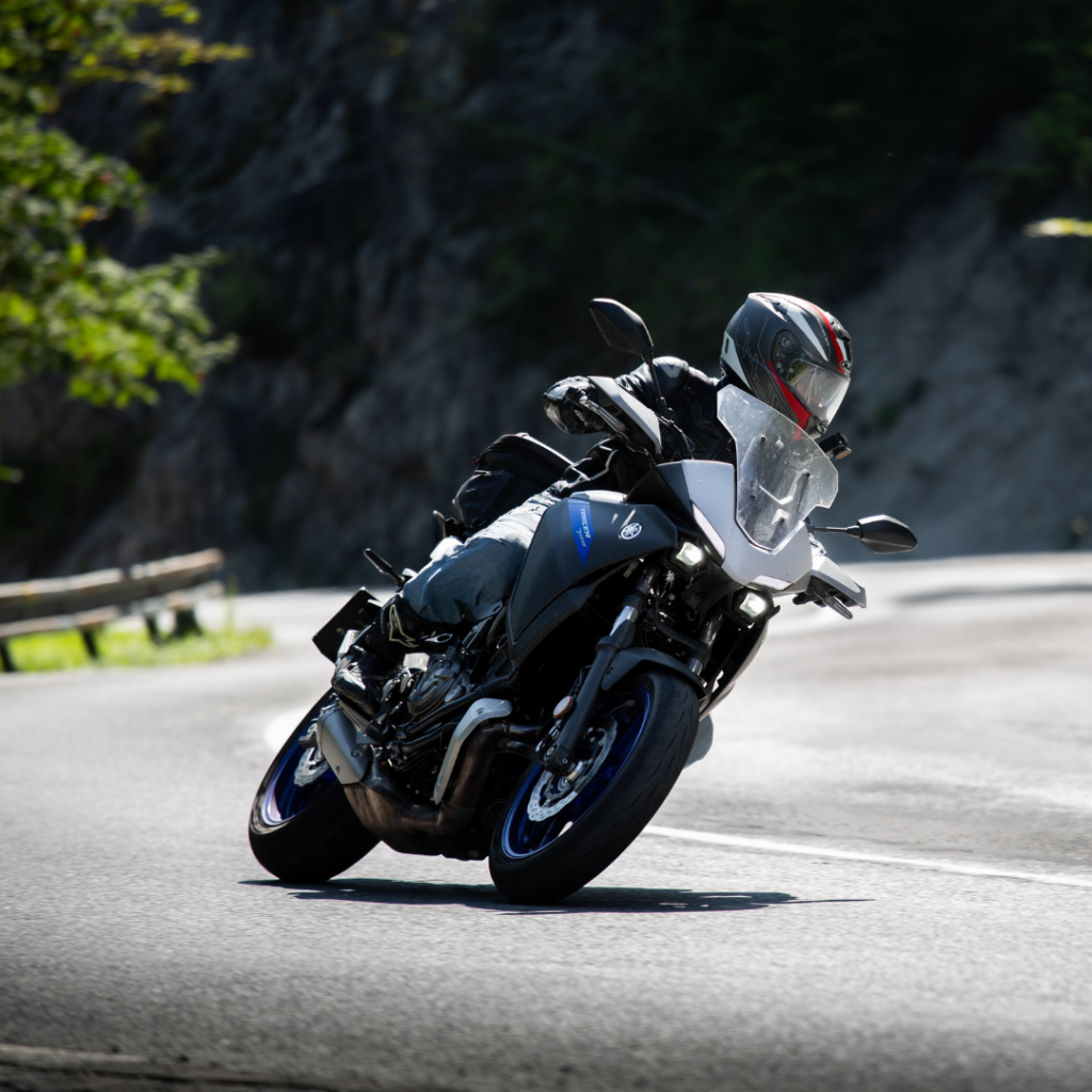 Person taking a turn in a motorcycle