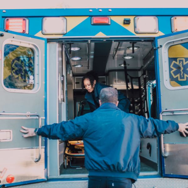 A medic opening the back of an ambulance