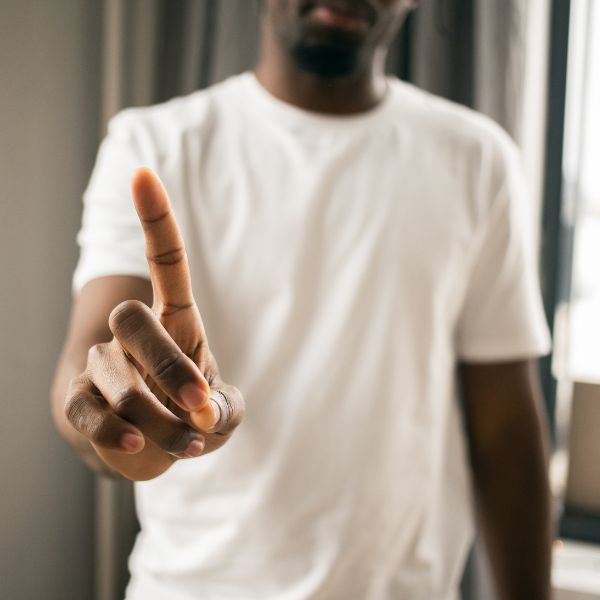 Motioning no with finger