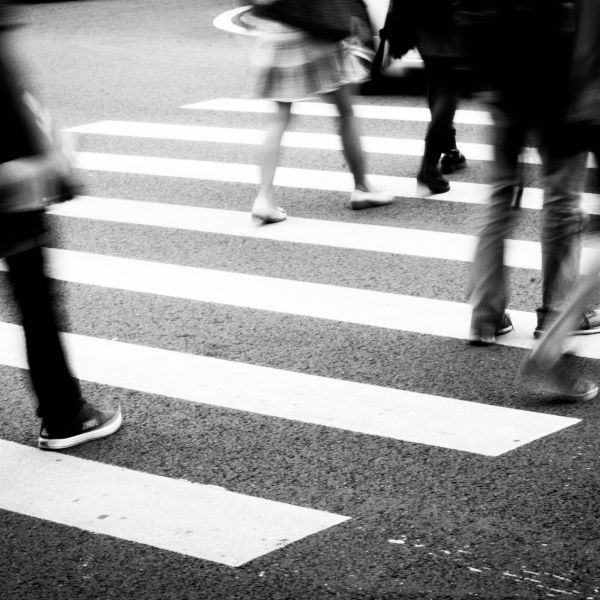 people using a crosswalk