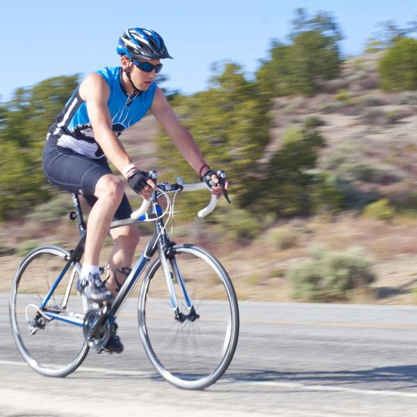 A cyclist riding on the road