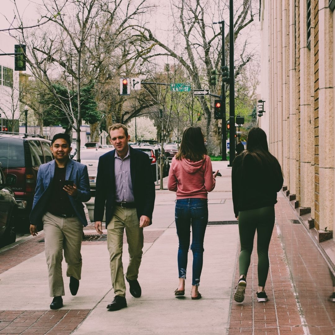 People walking on the sidewalk