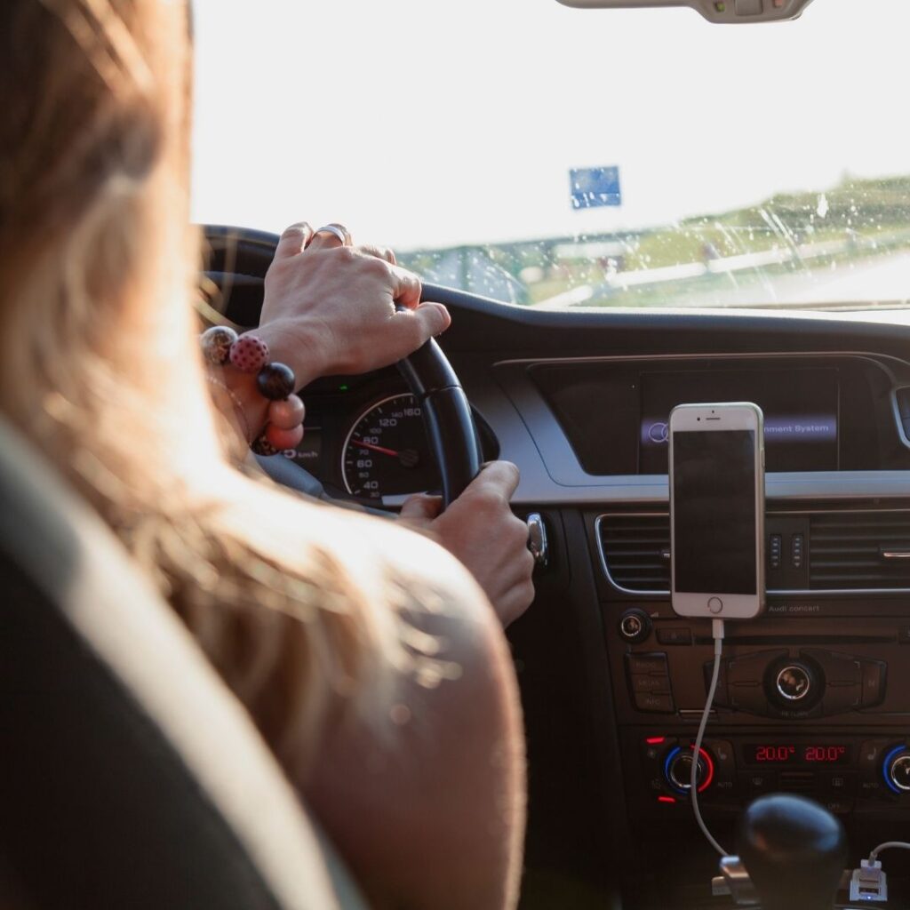 Woman driving down the road