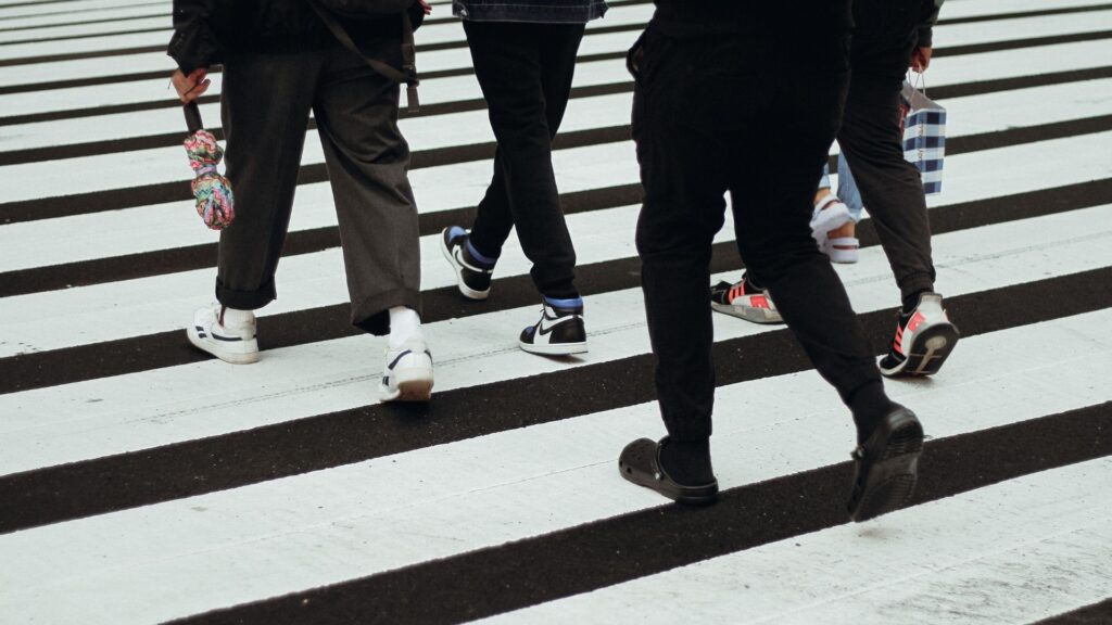 people walking in crosswalk