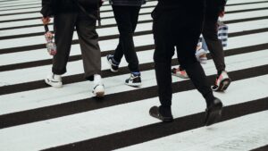 people walking in crosswalk