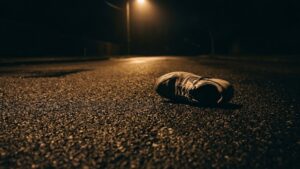 shoe on side of road