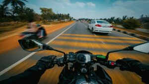 motorcycle on road with cars