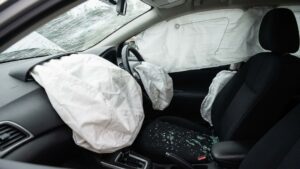 inside of wrecked car with airbags out